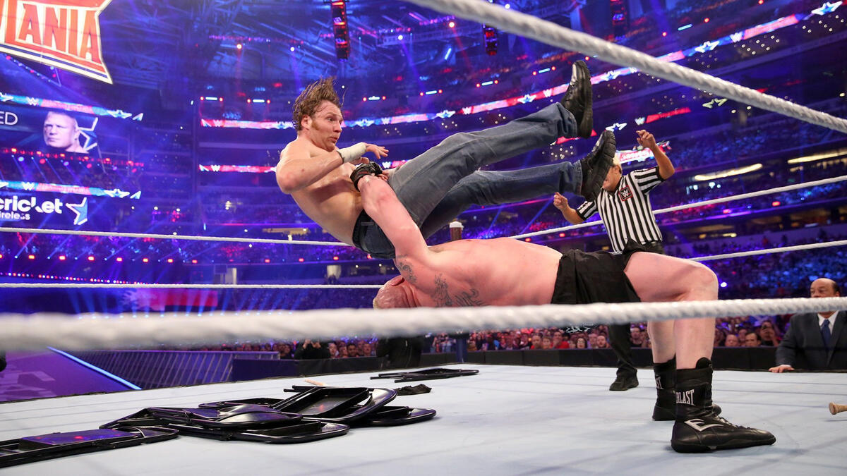 Despite Ambrose's incredible efforts, Brock hits his 13th German Suplex, then an F-5 onto steel steps, for a brutally hard-fought victory.