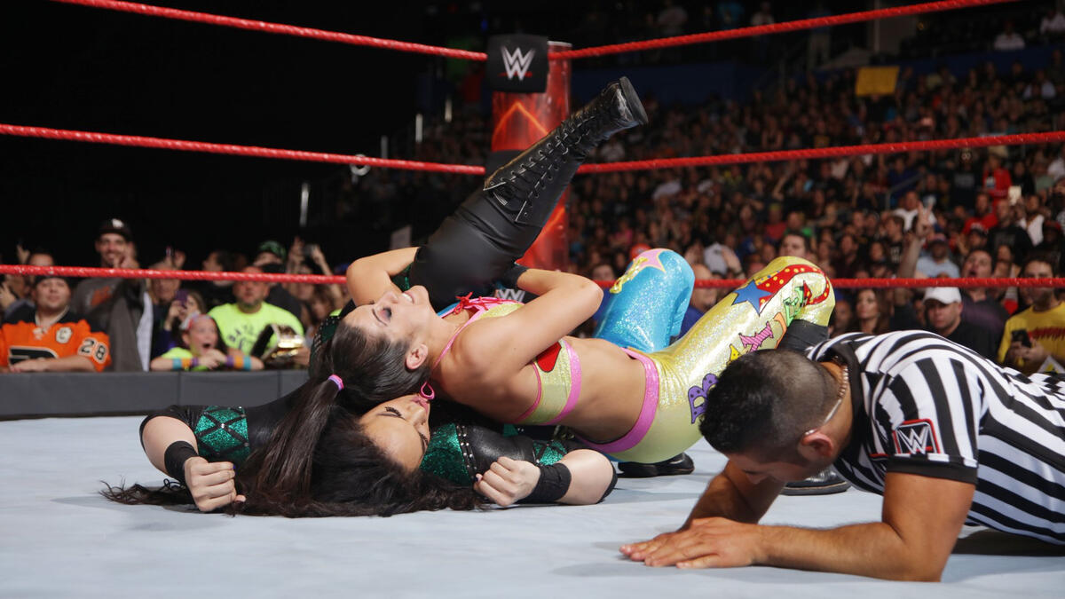 The distraction allows Bayley to connec with the Bayley-to-Belly for the win.