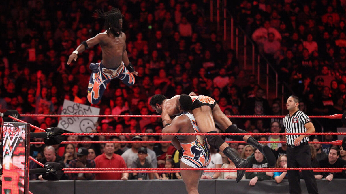 Kofi Kingston and Big E capitalize on the momentum shift and connect with the Midnight Hour for the win.
