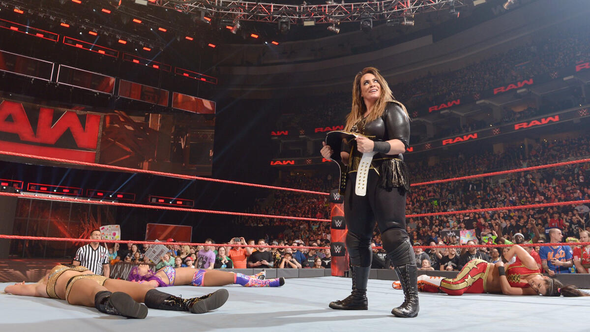 Jax stands tall with the Raw Women's Championship after laying out her competition.