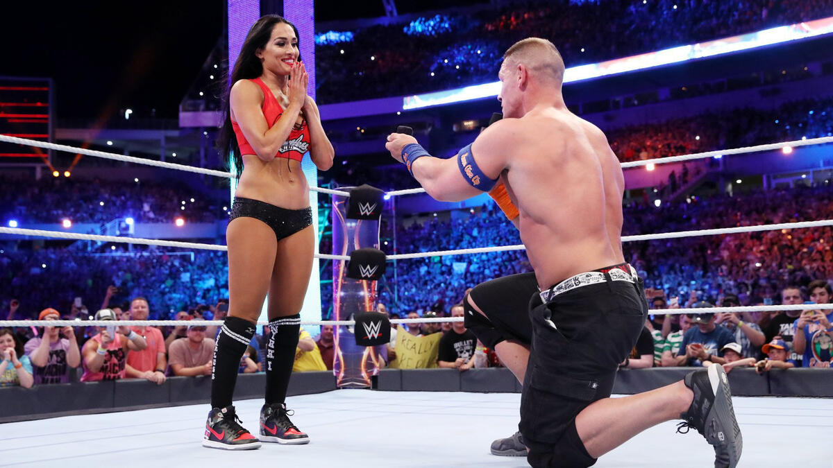 Cena drops to one knee and proposes to Nikki!