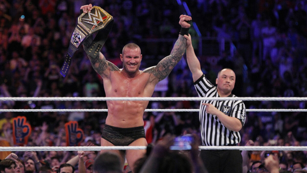 The Viper hits an RKO outta nowhere for the victory to claim his 14th World Championship in WWE.