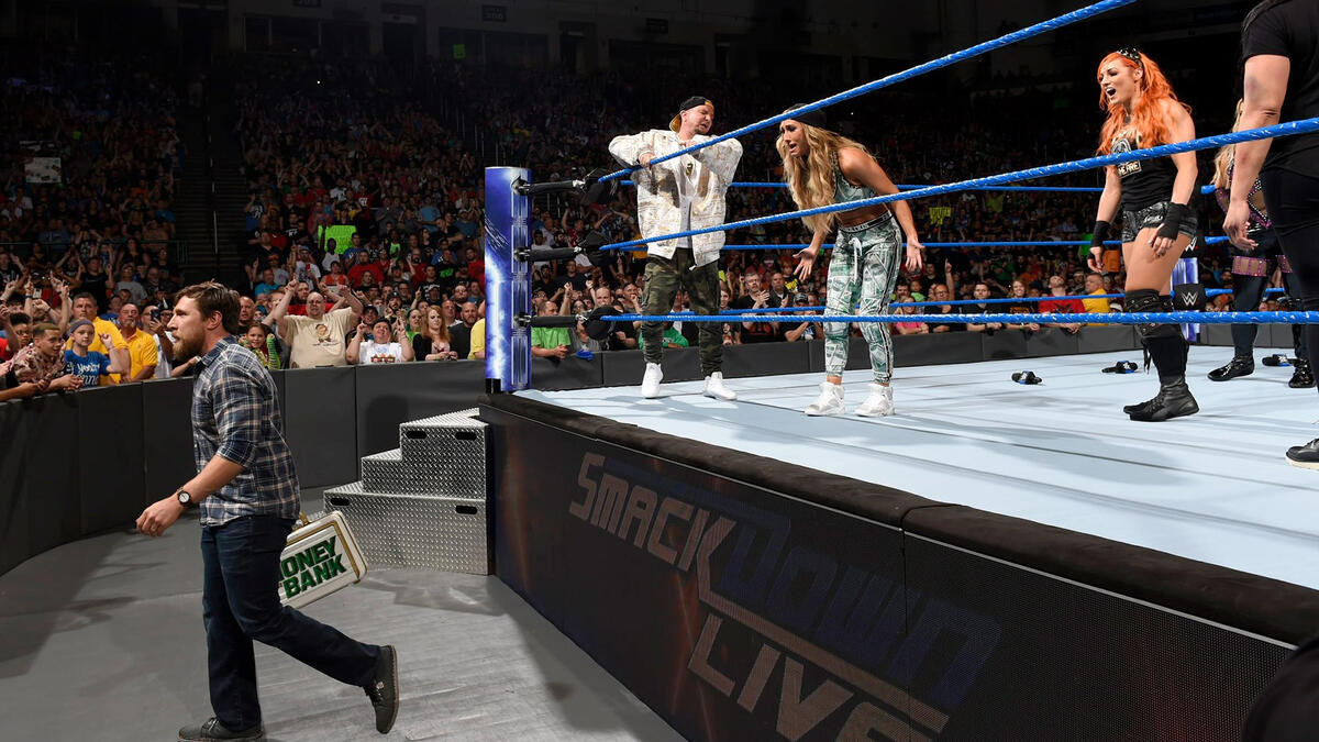 Bryan nullifies Carmella's victory and exits with the briefcase.