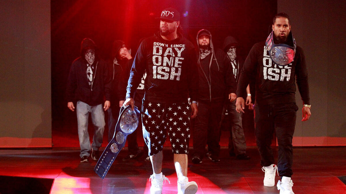 With their crew in tow, The Usos walk to the ring with a purpose.