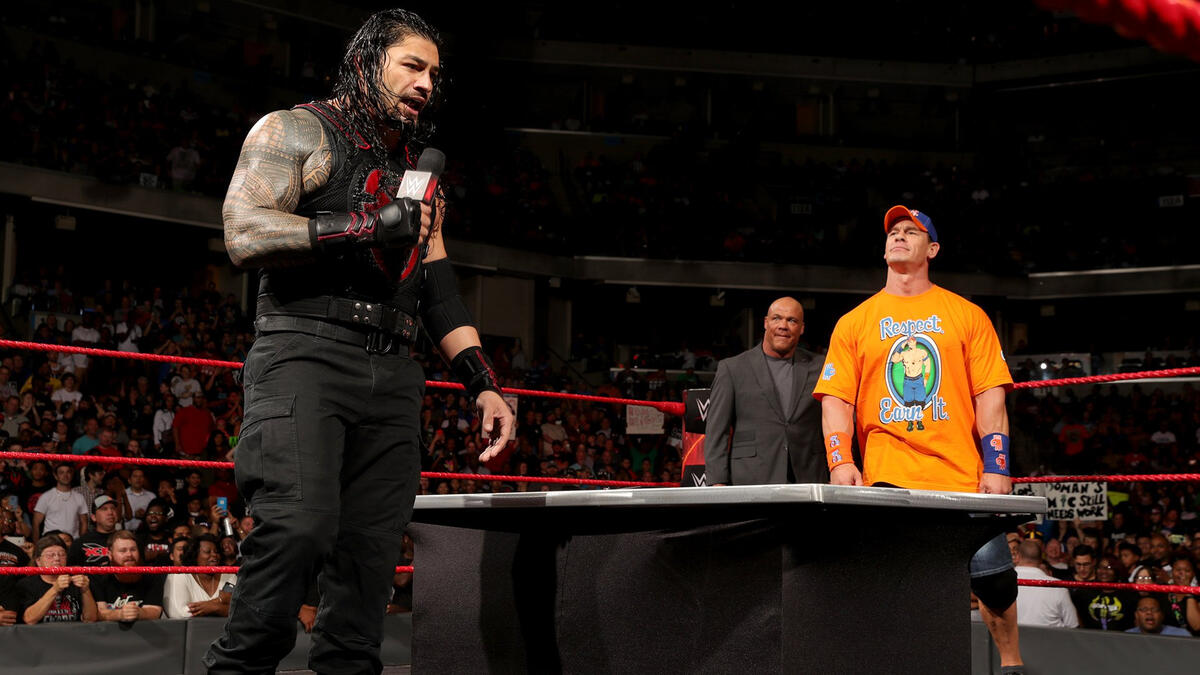 Reigns labels Cena as a "backstabbing shark"...