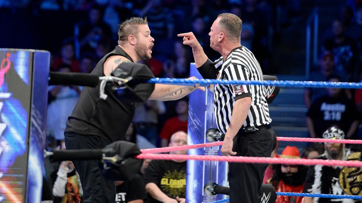 ... and KO continues to argue with the official.