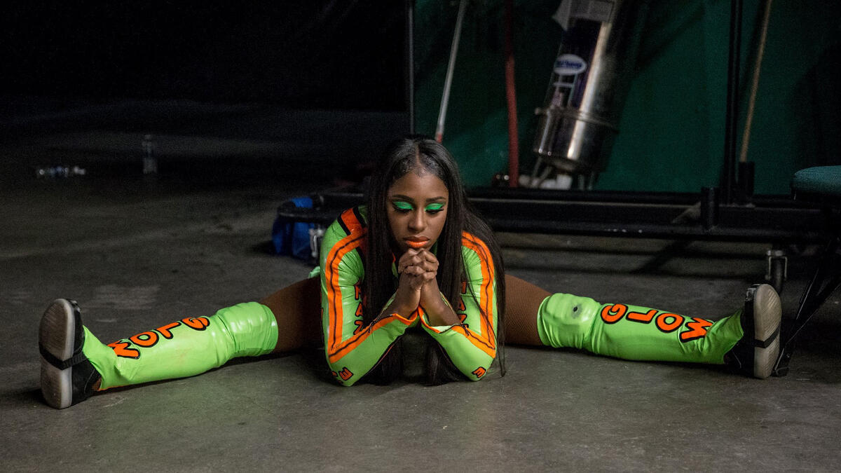 Naomi prepares for her match against Tamina.