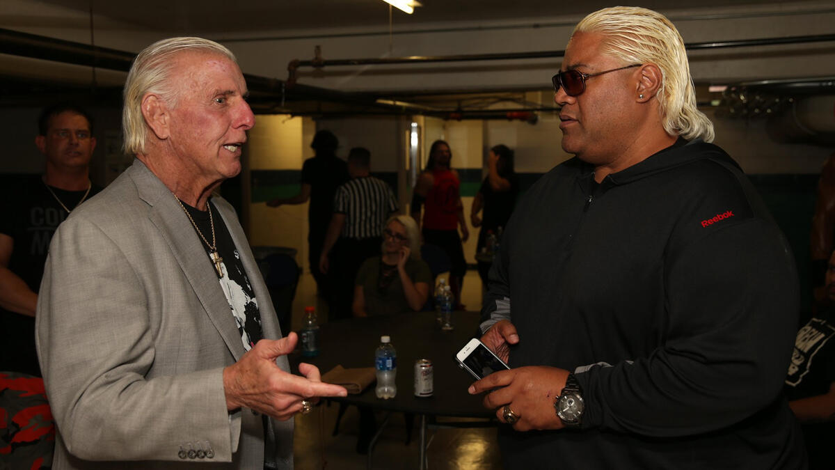WWE Hall of Famers Ric Flair and Rikishi.