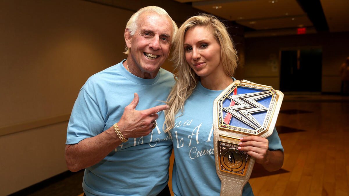 SmackDown Women's Champion Charlotte Flair joins her father in continuing the legacy of Flair at Starrcade.