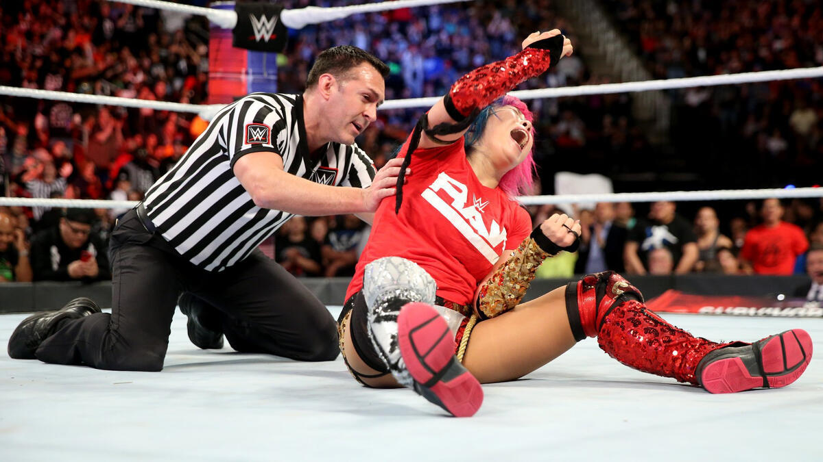 Asuka takes out both Tamina and Natalya to claim victory for Team Raw.