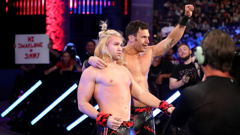 Yet, thanks to interference by Fandango, Breeze is able to counter Jimmy Uso's top-rope splash with a pair of knees en route to snaring the win.