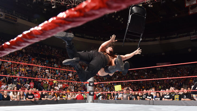 The match ends in a double count-out. Reigns spears Rusev to end a post-match chair assault.