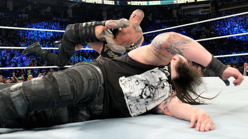 Orton sacrifices himself to save the Wyatt Family patriarch from a Spear by The Big Dog.