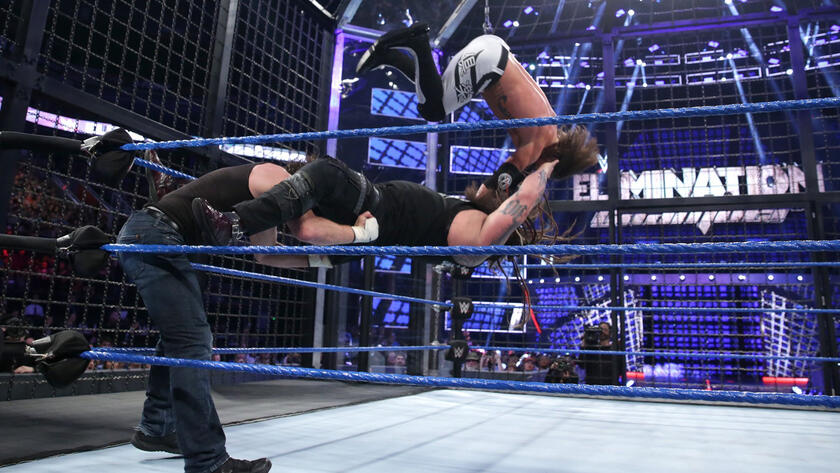 AJ Styles takes a devastating fall off the pod as he suffers the worst of a Tower of Doom-like maneuver. 