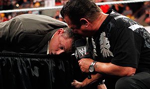 Michael Cole and Jerry Lawler