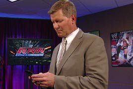 Who is John Laurinaitis texting?