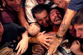 CM Punk celebrates his WWE Championship win over Alberto Del Rio with fans at Madison Square Garden.