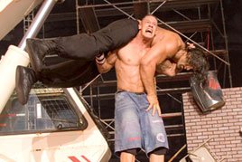 John Cena prepares to deliver a monster-sized Attitude Adjustment to The Great Khali