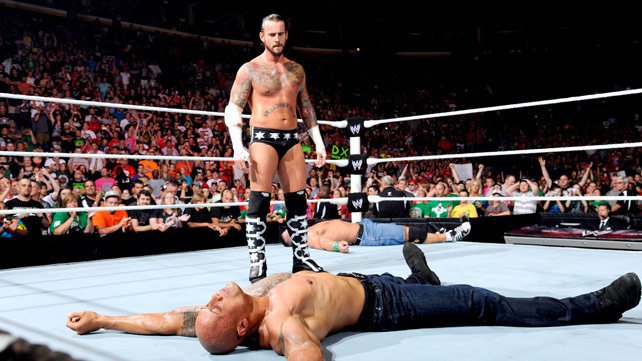 CM Punk gives Rock the GTS on Raw 1,000
