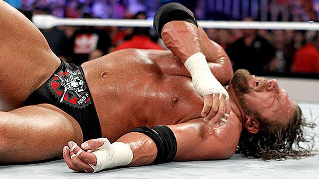 Triple H's arm broken at SummerSlam