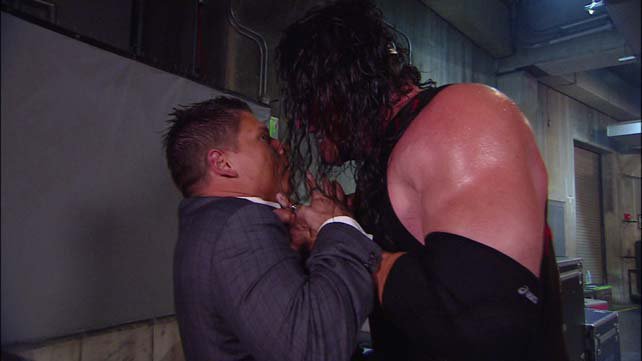 Kane attacks Josh Mathews