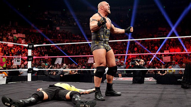 Ryback stands over the fallen CM Punk