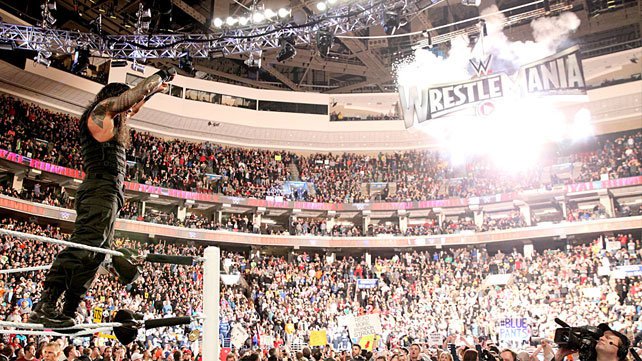 Roman Reigns celebrates his 2015 Royal Rumble Match victory.