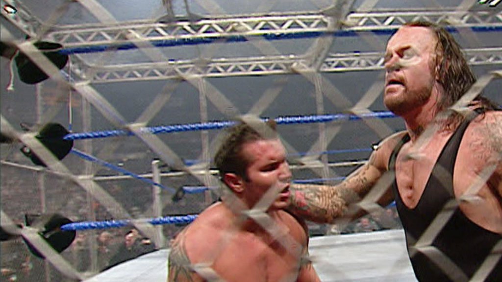 Image result for armageddon 2005 Randy Orton with Bob Orton vs The Undertaker