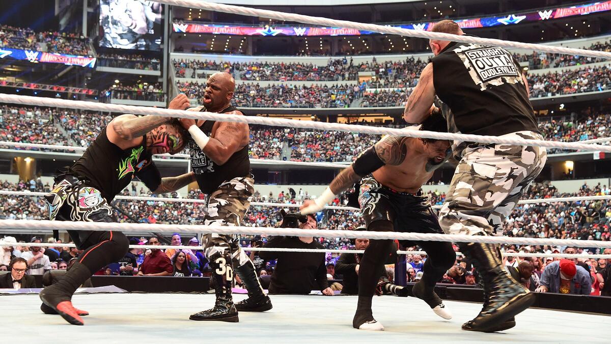 Bubba Ray & D-Von ambush The Usos at the opening bell.