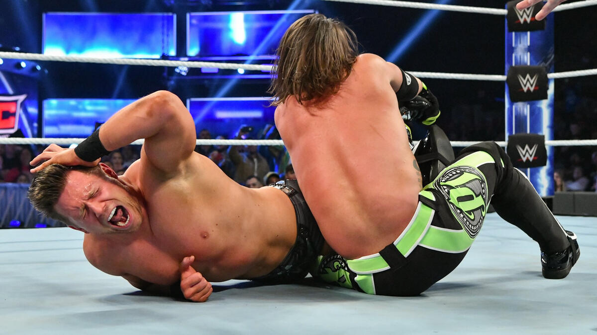 ... and forces Miz to tap to the Calf Crusher!