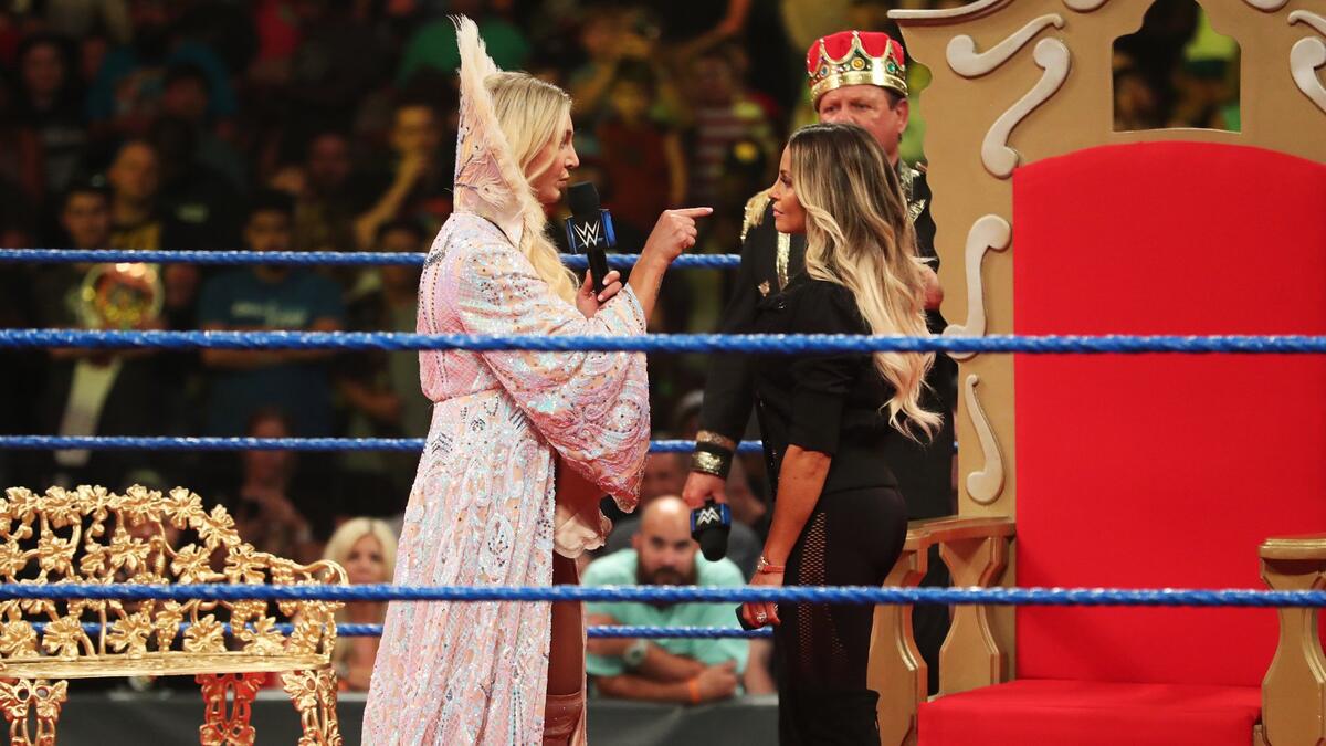 Flair condescendingly congratulates Trish for being a mom.