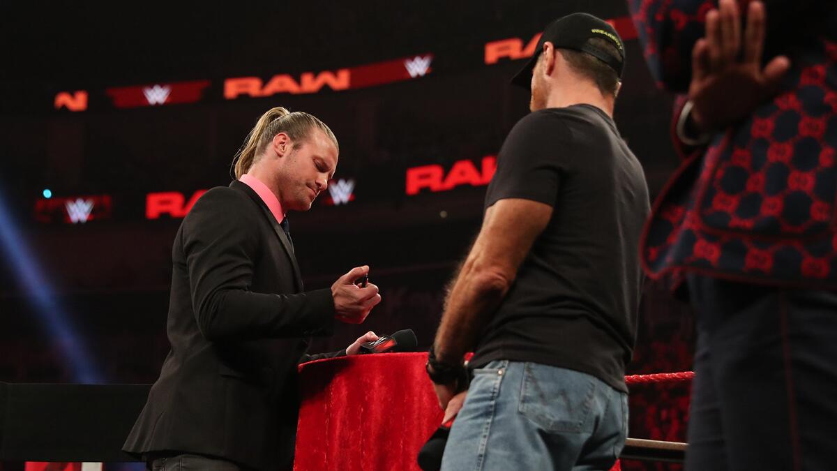 Dolph signs the contract.