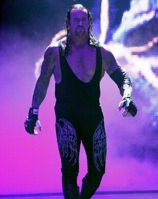 The Undertaker attacks World Heavyweight Champion KaneWWE