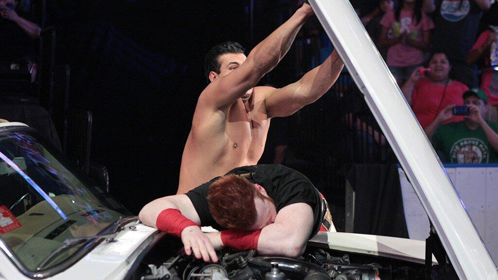 Alberto Del Rio slams the hood of his car on World Heavyweight Champion ...