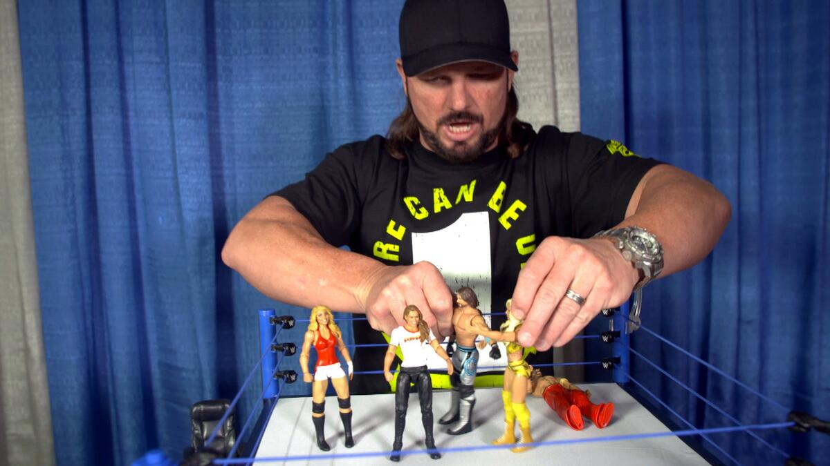 AJ Styles checks out Ronda Rousey's first WWE action figure | WWE