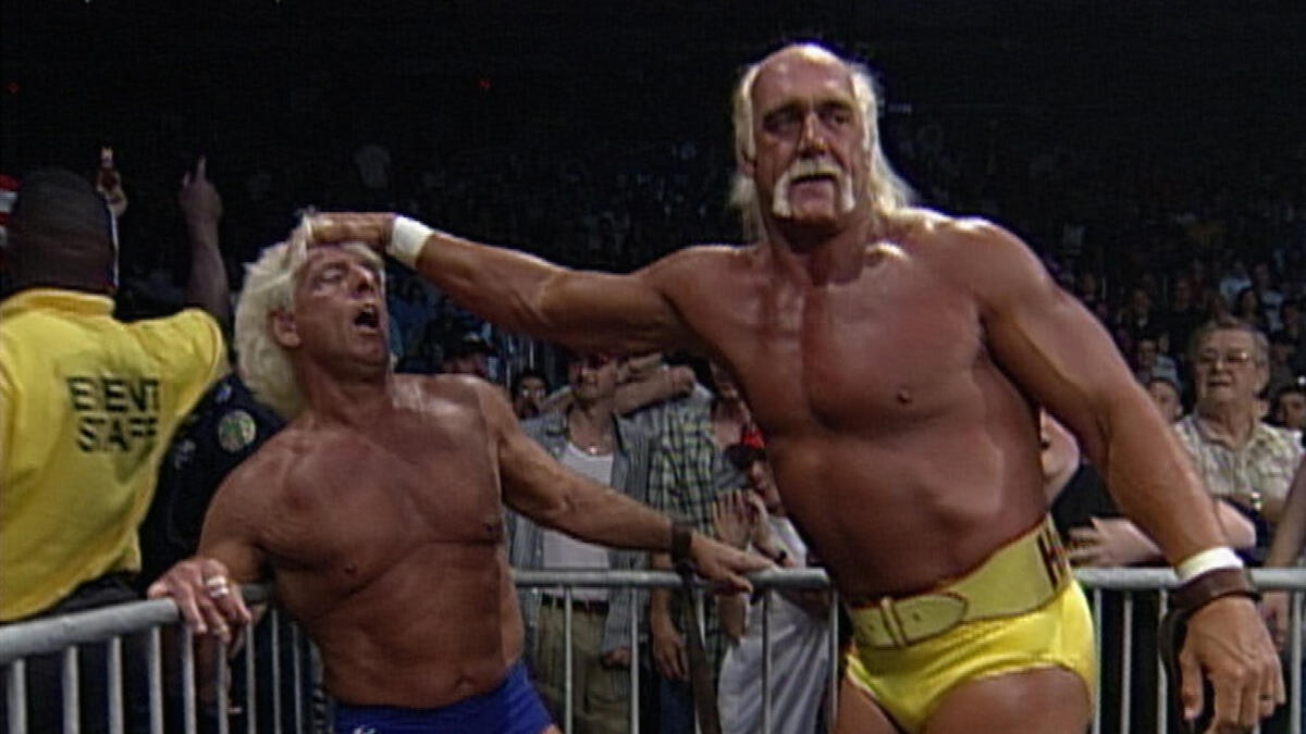 Hulk Hogan and Ric Flair brawl in and around the ring during the main event...
