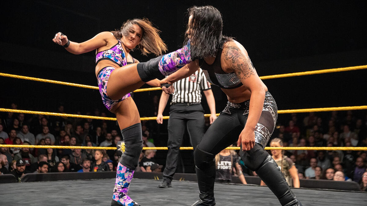 Dakota Kai and Shayna Baszler collide in ferocious nontitle fight.