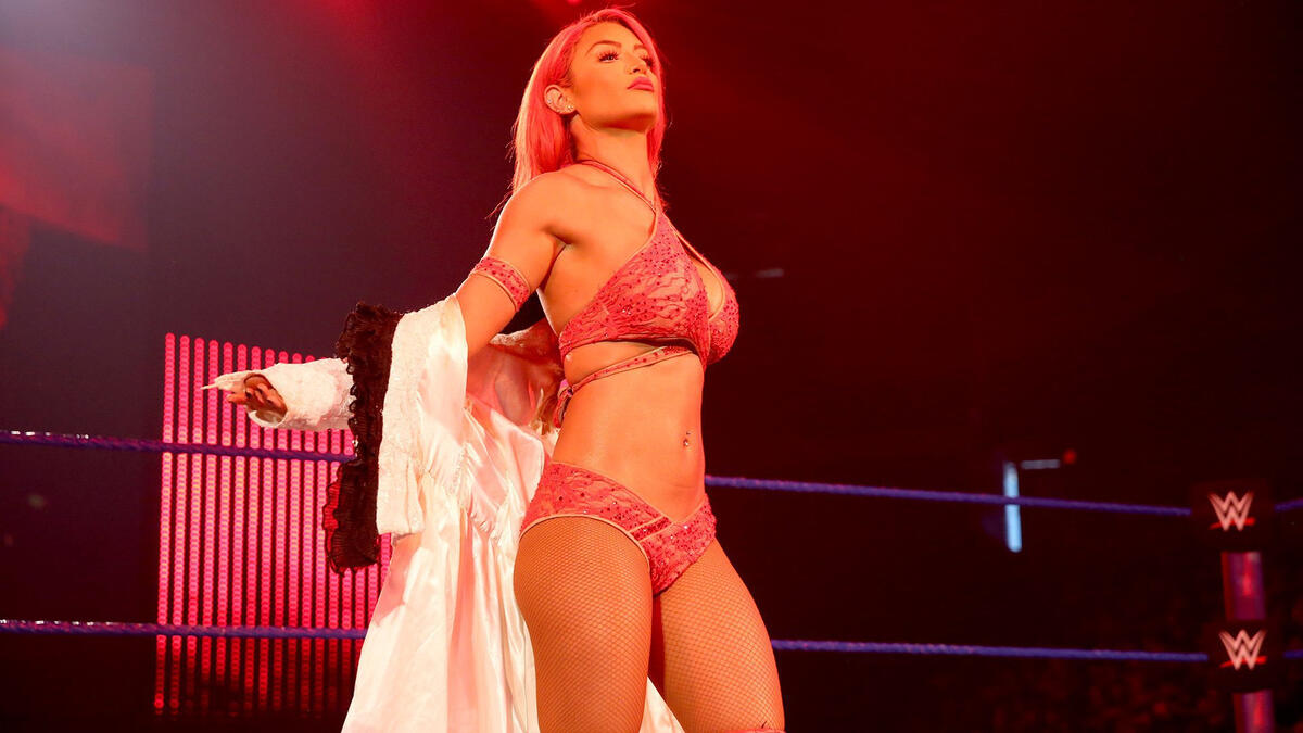 Photos: Eva Marie has a wardrobe malfunction prior to her match against Bec...
