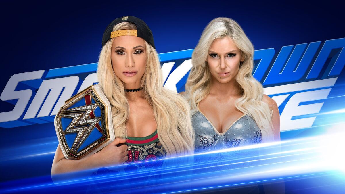 charlotte-flair-and-carmella-sign-the-contract-for-their-smackdown