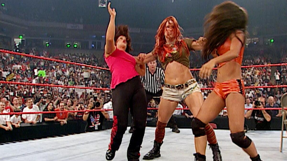 Relive the legendary rivalry between Trish Stratus and Lita on A&E ...