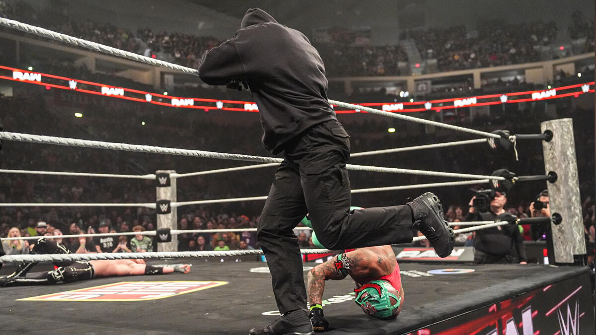 The masked assailant helps Logan Paul defeat Rey Mysterio: Raw ...