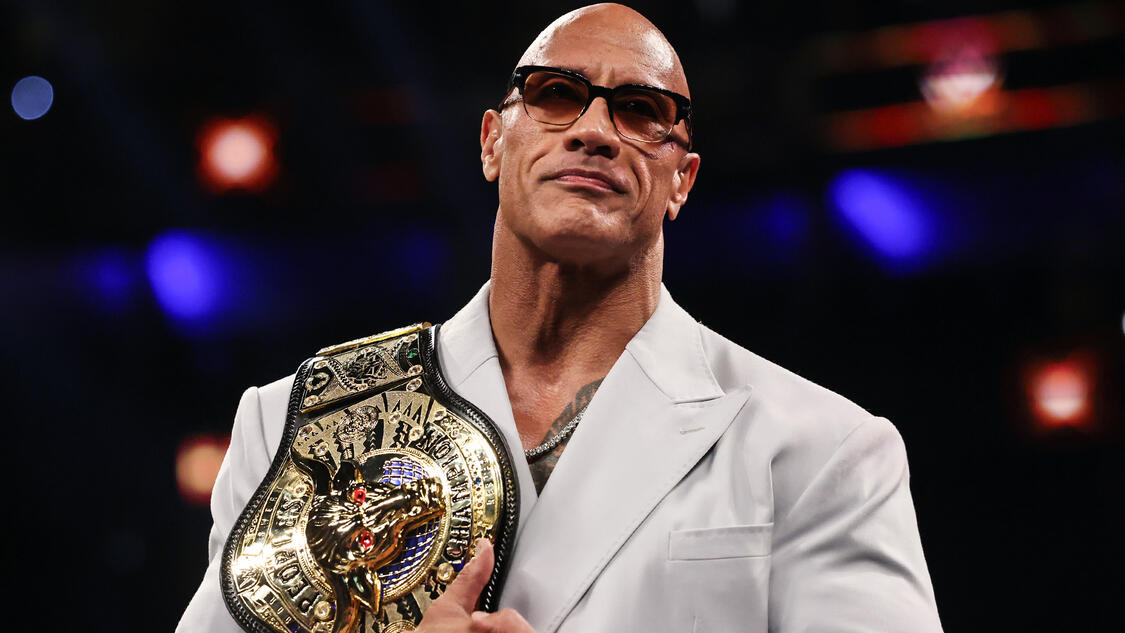 The Rock receives the People's Championship from Lonnie Ali: 2024 WWE Hall of Fame highlights