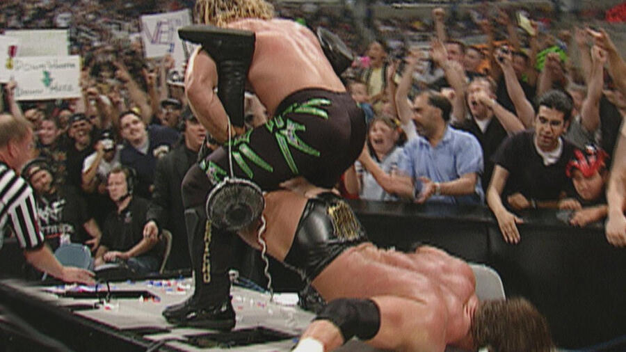 Triple H tears his quad: Raw, May 21, 2001 | WWE