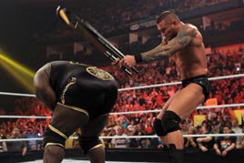 Orton attacks Henry with a chair at WWE Hell in a Cell