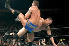 The Rock & Mick Foley vs. Evolution at WrestleMania XX